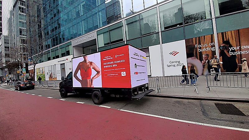 LED advertising truck on a city street